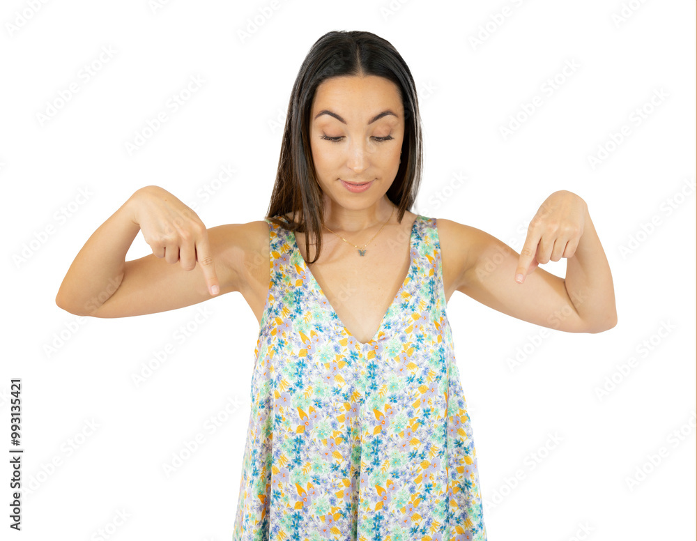 Young natural caucasian woman points down with fingers, positive feeling over transparent background. Young natural caucasian woman points down with fingers, positive feeling over transparent background.