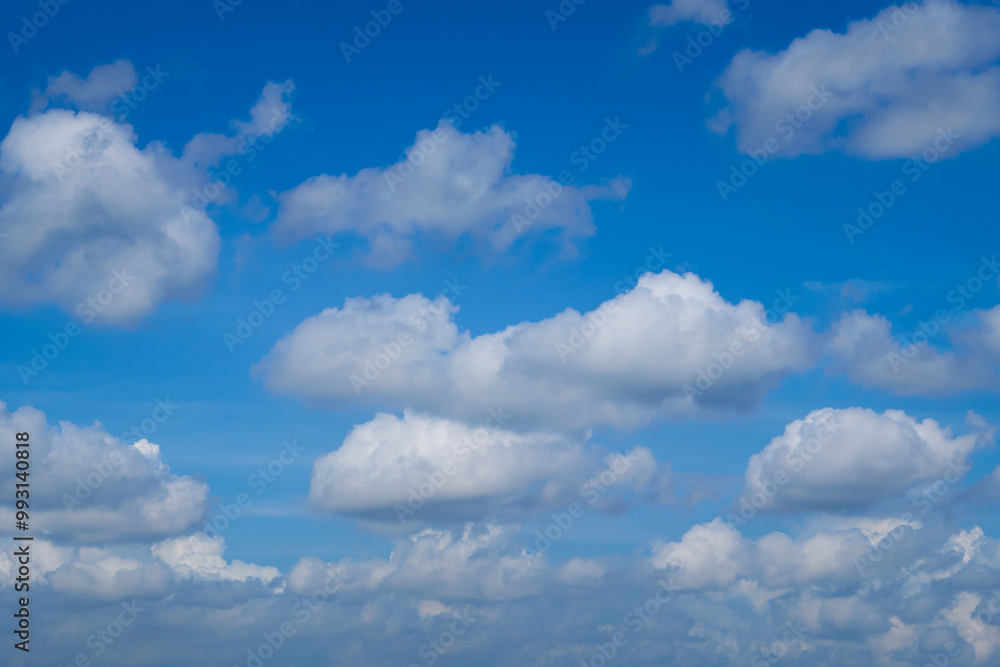 Beautiful blue sky with white clouds forming on sunny day Beautiful blue sky with white clouds forming on sunny day
