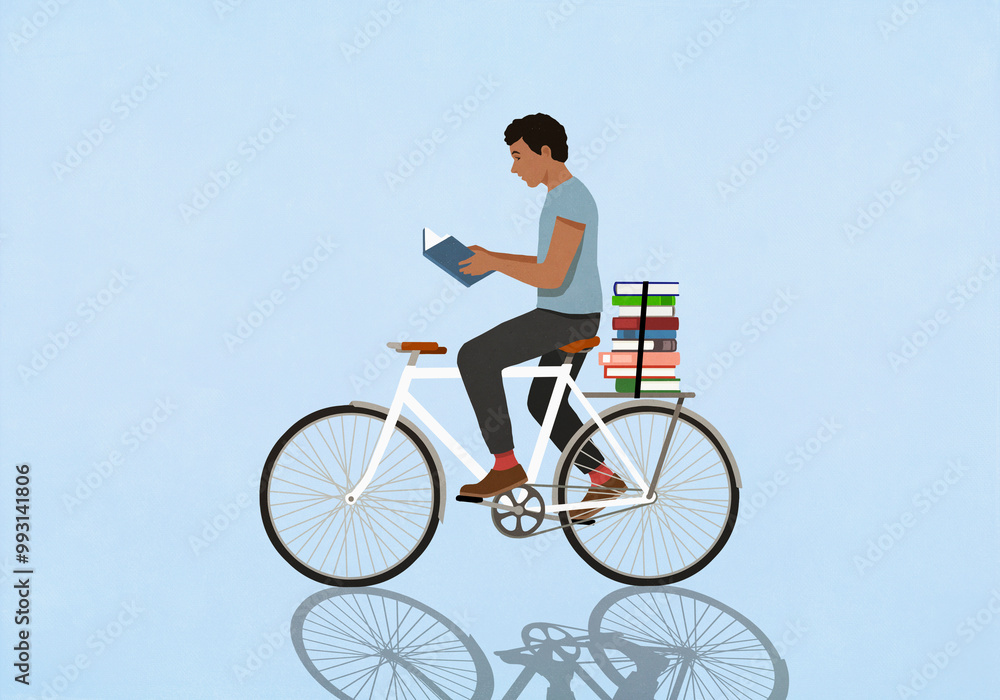 Man reading book while riding bicycle on blue background
Man reading book while riding bicycle on blue background