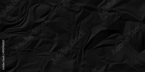 Black crumpled paper texture . Black wrinkled paper texture. Black paper texture . Black crumpled and top view textures can be used for background of text or any contents .