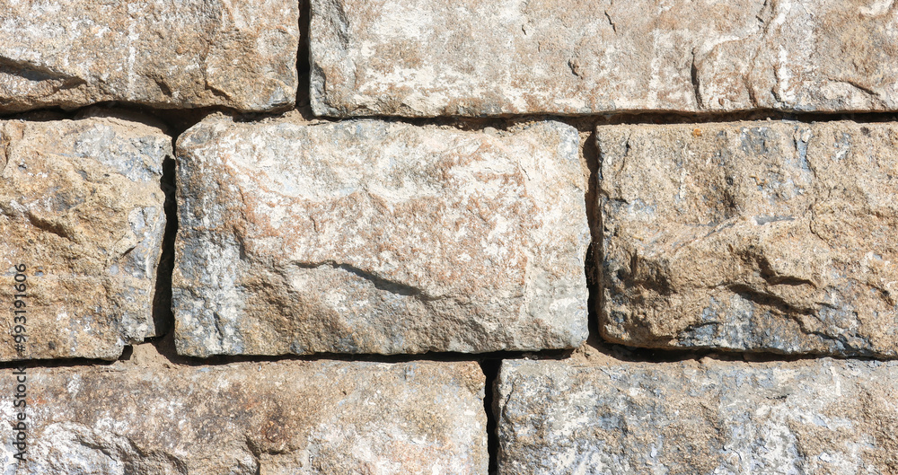 Fototapeta premium Detail of stone wall for background texture.