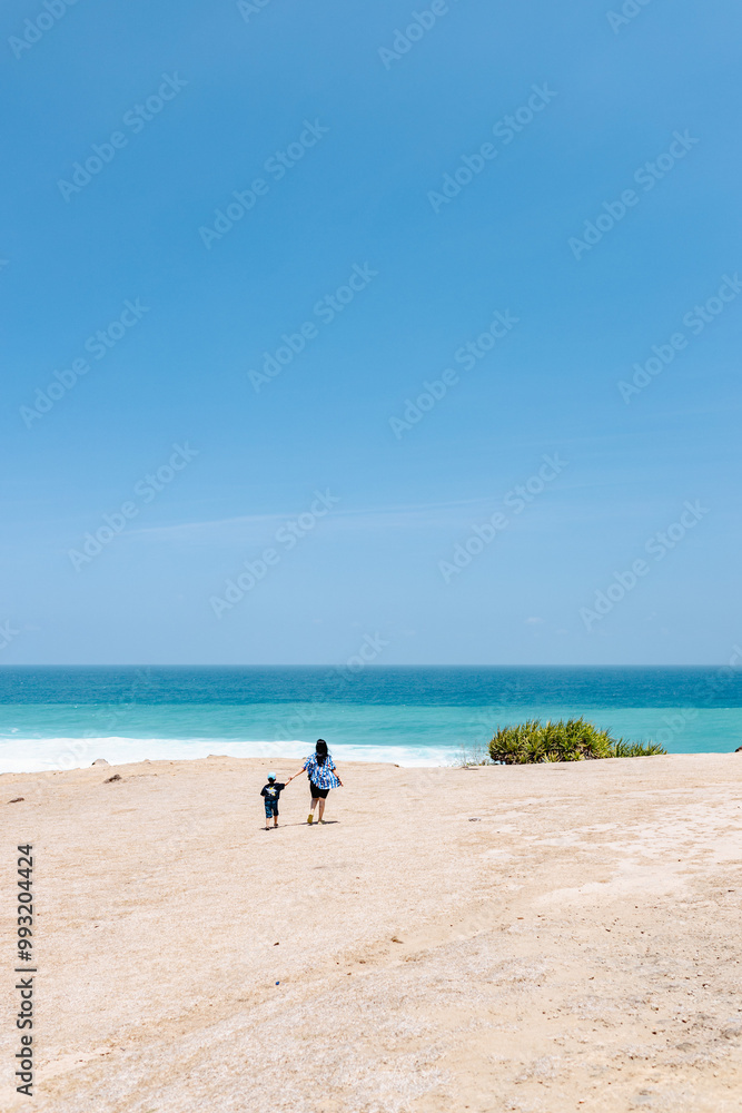 Mother and son walking to the edge of the cliff Mother and son walking to the edge of the cliff