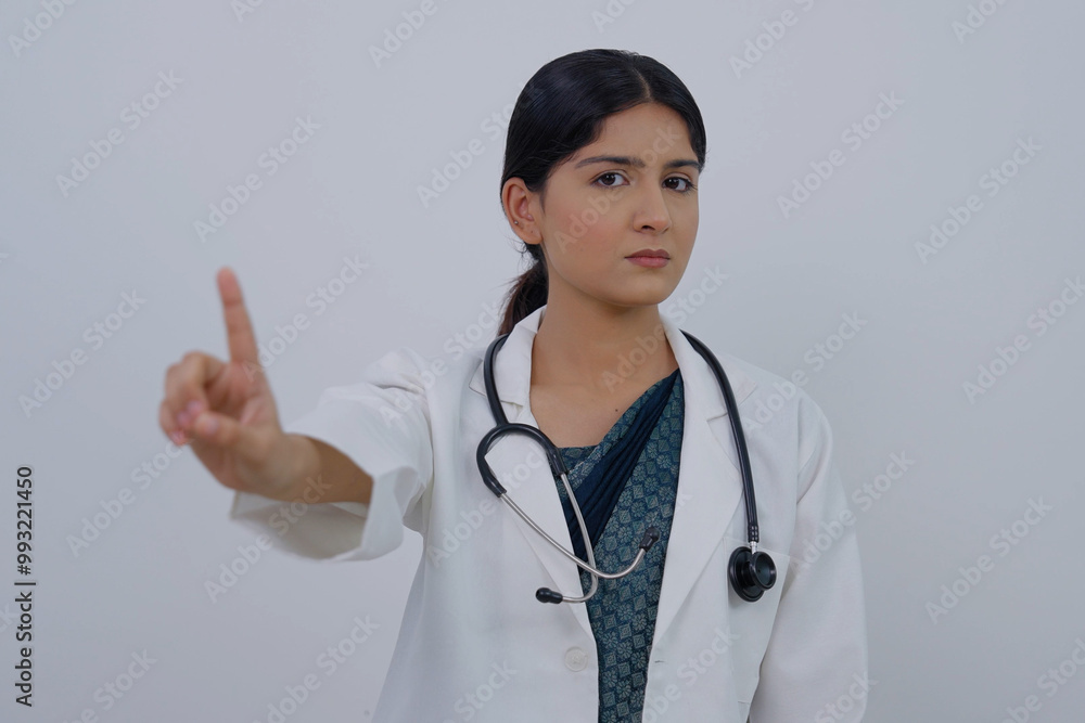 Indian Female Doctor Saying No with Finger Indian Female Doctor Saying No with Finger
