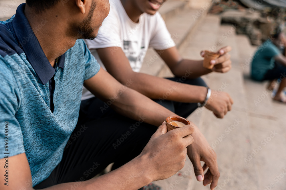 Close-up of indian man enjoying traditional chai tea outdoors Close-up of indian man enjoying traditional chai tea outdoors