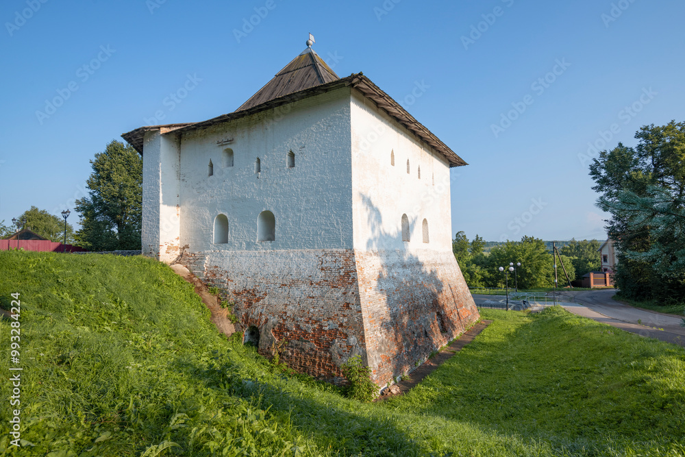 The ancient Spasskaya Tower of the Vyazma Kremlin on a sunny July morning. Vyazma. Smolensk region, Russia The ancient Spasskaya Tower of the Vyazma Kremlin on a sunny July morning. Vyazma. Smolensk region, Russia