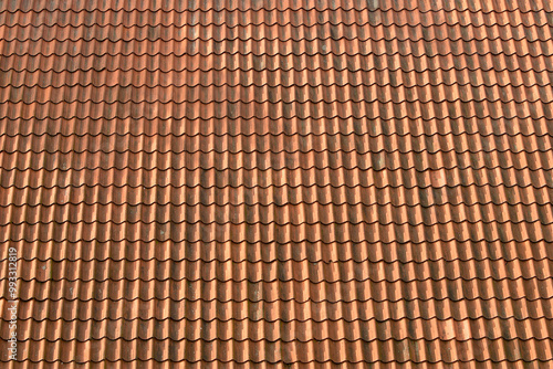 Red ceramic tiles background. Red house roof.