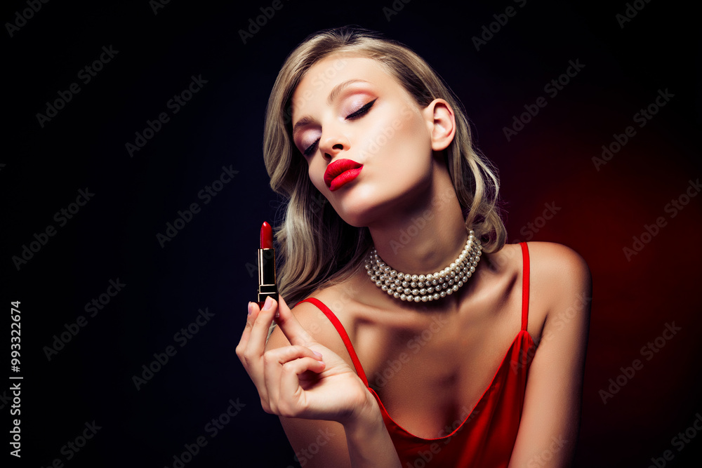 Obraz premium Photo of gorgeous attractive lady advertising red matte pomade special festive event isolated on dark color background