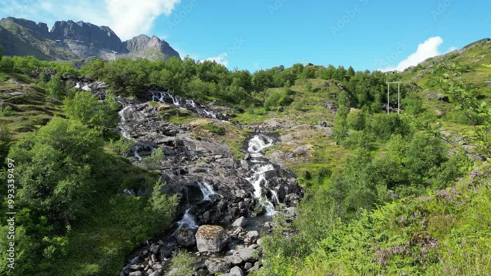 Landscape with Sorvagen waterfall at Munkebu-stig near Sorvagen. Lofoten district in Norway Landscape with Sorvagen waterfall at Munkebu-stig near Sorvagen. Lofoten district in Norway