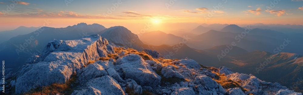 Obraz premium Panoramic view of mountain range during autumn sunrise