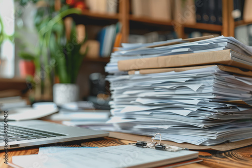 A bunch of documents on the desk in the minimalistic office.