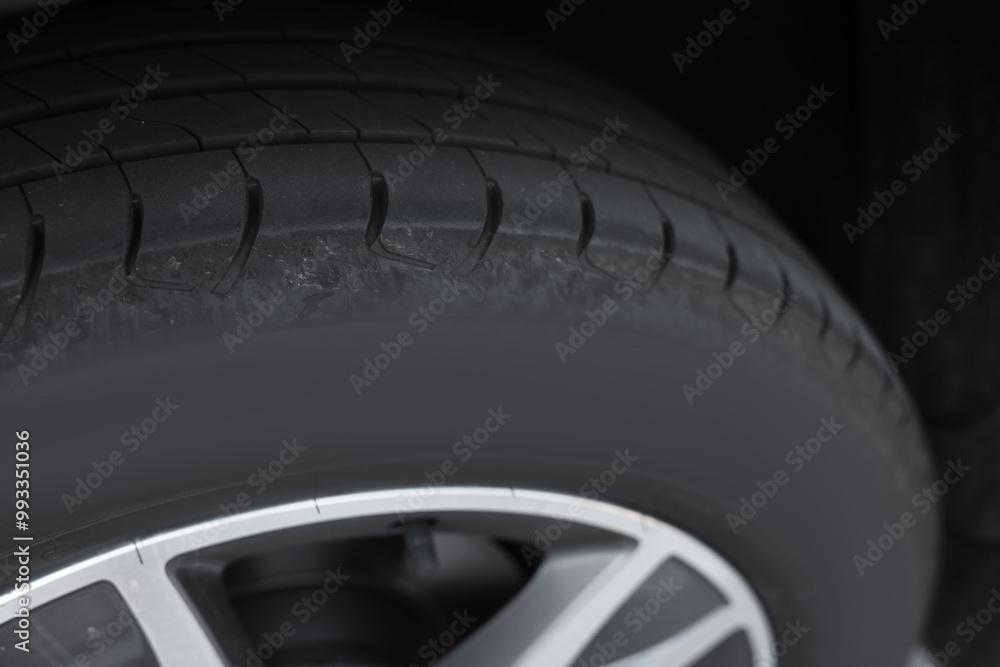 Modern car with big wheel, closeup view Modern car with big wheel, closeup view