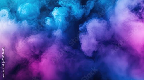 Vibrant misty smoke in shades of blue and purple against a dark backdrop