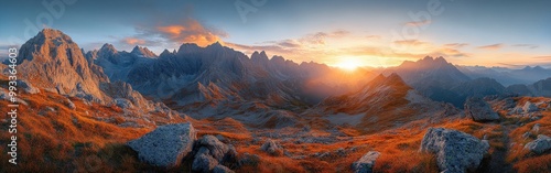 Panoramic view of mountain range during autumn sunrise