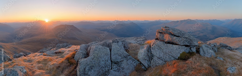Panoramic view of mountain range during autumn sunrise Panoramic view of mountain range during autumn sunrise