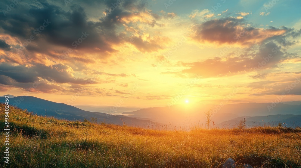 Stunning sunset over grassy hills with scenic sky Stunning sunset over grassy hills with scenic sky