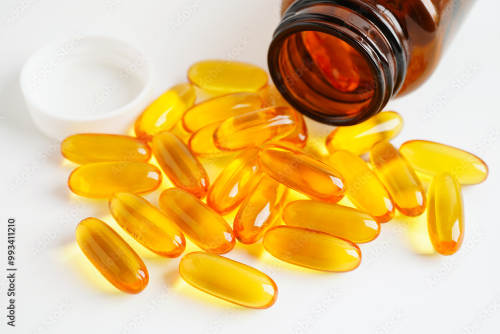 Fish oil or Cod liver oil gel in capsules with omega 3 vitamins, supplementary healthy food. Fish oil or Cod liver oil gel in capsules with omega 3 vitamins, supplementary healthy food.