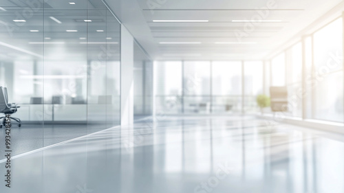 Blurred office interior background with a blurry modern white and glass business space