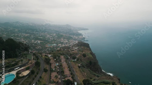 Rocky coastline of the Portuguese island of Madeira near Christo Rei, Canico. Drone aerial video.