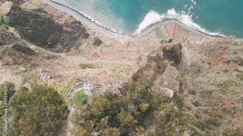 Top down view of the Cabo Girao viewpoint located on the cliff on the Madeira Island, Portugal. Aerial drone video.