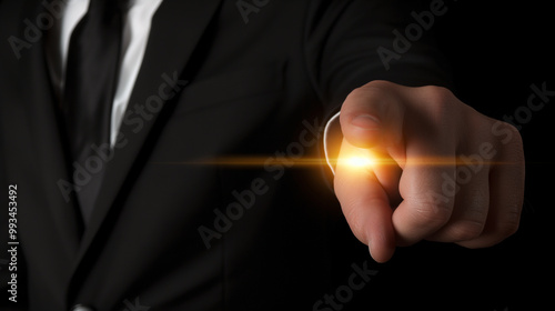 Businessman Pointing Finger with Light Beam