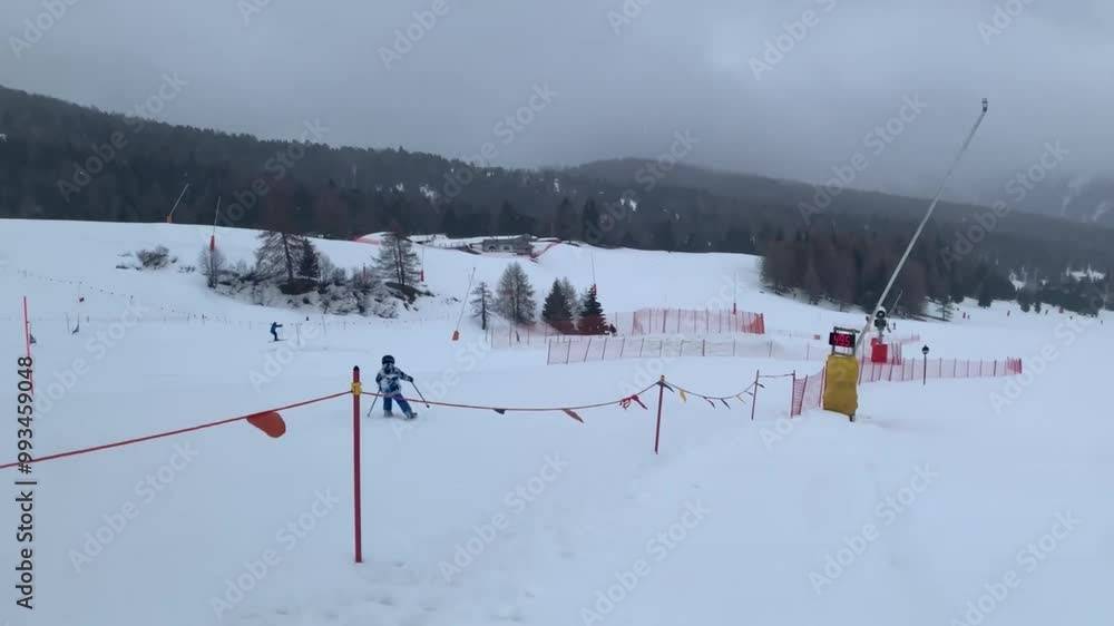Children and adults, happy family in winter clothing at ski vacation, skiing, wintertime Children and adults, happy family in winter clothing at ski vacation, skiing, wintertime