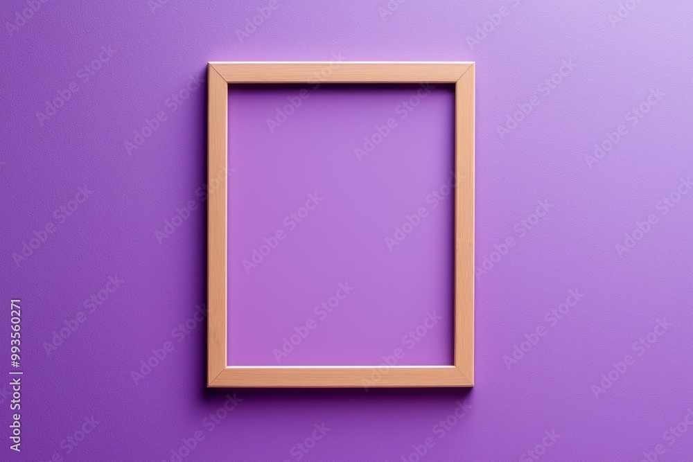 A pastel purple background with a simple wooden frame in the center, its blankness contrasting the softness of the color. 