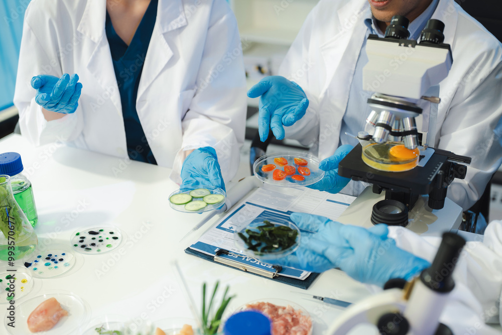 Microbiologist Working on Molecule Samples in Modern Food Science Laboratory, Control experts inspect the concentration of chemical residues. hazards, standard, contaminate. Microbiologist Working on Molecule Samples in Modern Food Science Laboratory, Control experts inspect the concentration of chemical residues. hazards, standard, contaminate.