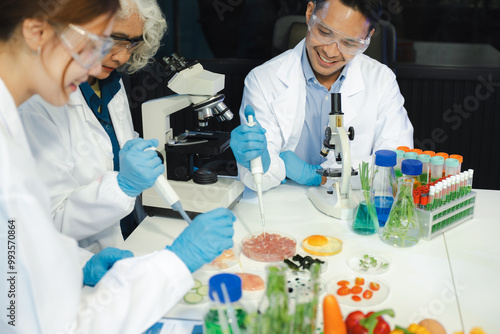 Microbiologist Working on Molecule Samples in Modern Food Science Laboratory, Control experts inspect the concentration of chemical residues. hazards, standard, contaminate.