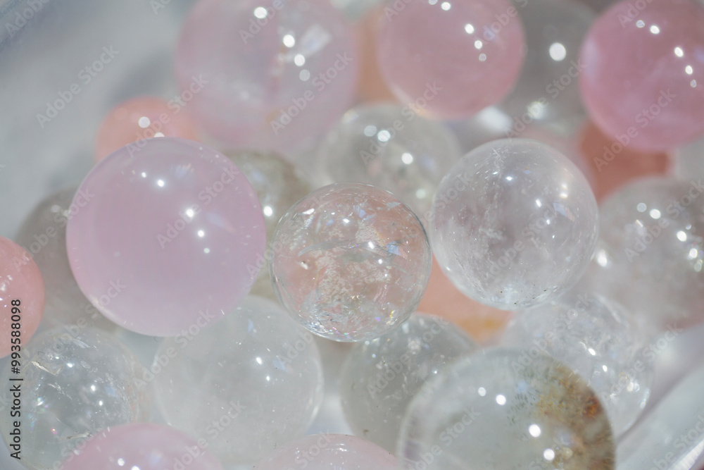 Spheres of pink and clear crystal quartz. Spheres of pink and clear crystal quartz.