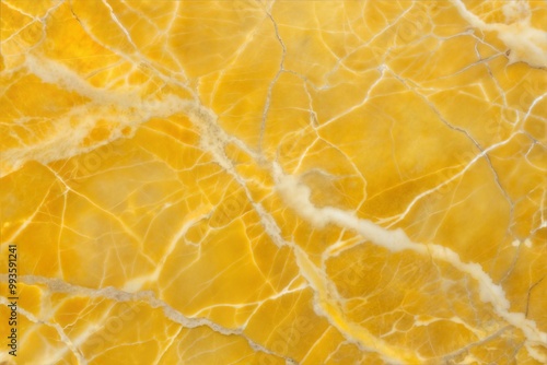 Golden marble slab with white veins close-up photo