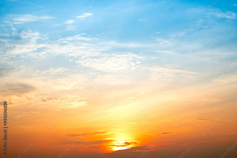 Beautiful , luxury soft gradient orange gold clouds and sunlight on the blue sky perfect for the background, take in everning,Twilight, Large size, high definition landscape photo Beautiful , luxury soft gradient orange gold clouds and sunlight on the blue sky perfect for the background, take in everning,Twilight, Large size, high definition landscape photo