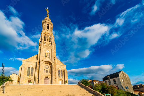 A view of the church of SAint michel mont Mercure, the highest point in the Vendée region, west france. photo