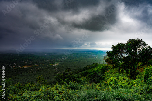 Cloud over the mountains with greenery in monsoon season in Kerala.  photo