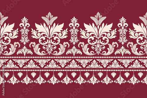 A seamless damask border pattern featuring intricate floral motifs and classical columns. Red background and white colour design create an elegant and timeless aesthetic