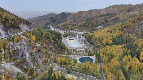 Picturesque mountain gorge and Medeu skating rink in the vicinity of the Kazakh city of Almaty on an autumn day photo