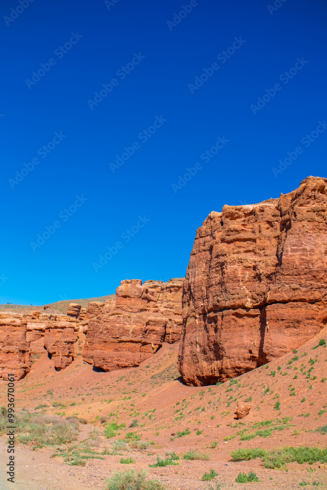 Charyn Canyon, Valley of Castles. The excellence of Kazakhstan. Panorama of natural unusual landscape. The red canyon of extraordinary beauty looks like a Martian landscape. Charyn Canyon, Valley of Castles. The excellence of Kazakhstan. Panorama of natural unusual landscape. The red canyon of extraordinary beauty looks like a Martian landscape.
