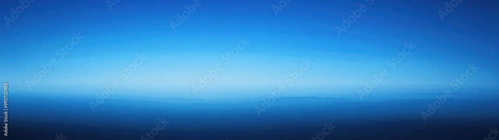 A serene gradient of blue hues, evoking calmness and tranquility in a vast expanse. A serene gradient of blue hues, evoking calmness and tranquility in a vast expanse.