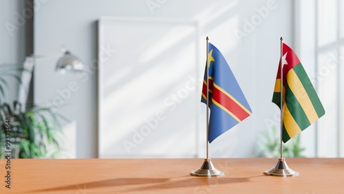 FLAGS OF CONGO DEMOCRATIC REPUBLIC AND TOGO ON TABLE photo