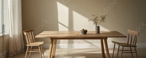 Scandinavian oak dining table with clean, sharp lines, surrounded by simple wooden chairs, all set against a neutral backdrop.