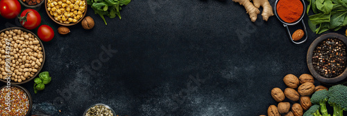 Wallpaper Mural WFPB Table View - Whole Food Plant Based Flatlay with Dried Beans Lentils Ginger Tomato Walnuts Broccoli Spinach Spice Pepper Ingredients - Dark Grey Chalkboard Countertop Blank Copy Space Torontodigital.ca