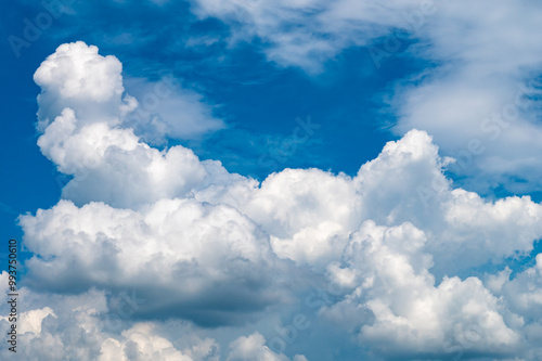 White heap clouds in the blue sky..