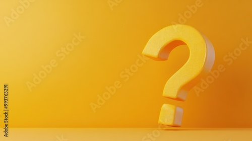 A large yellow question mark on a bright yellow background, symbolizing inquiry and curiosity. photo