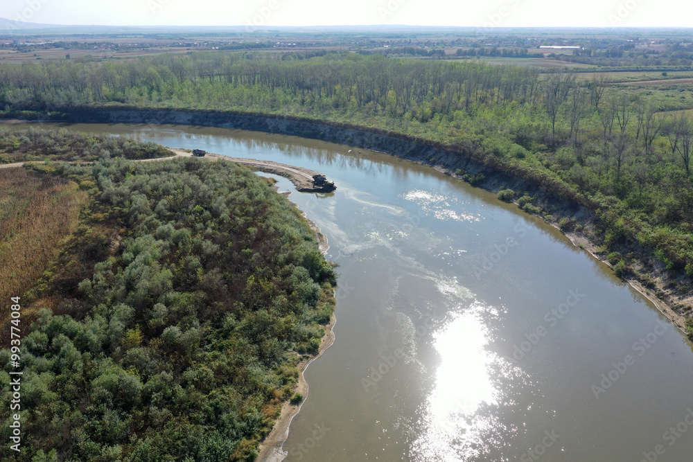 Sand and gravel exploitation in the river aerial view Sand and gravel exploitation in the river aerial view
