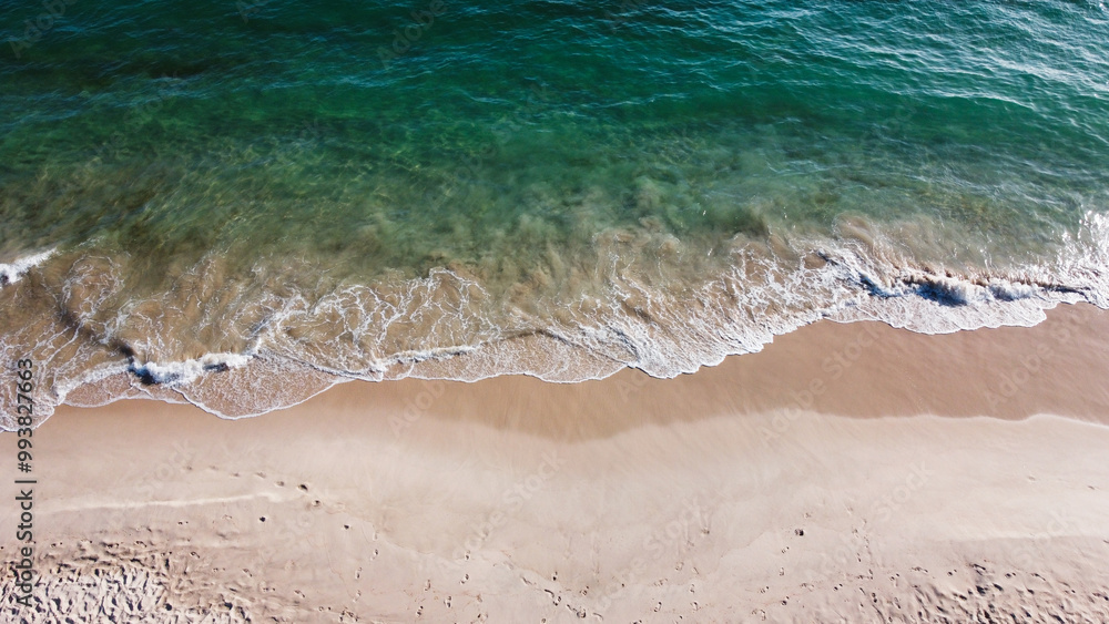 Aerial view of the beautiful turquoise sea with algae in Comporta, Portugal Aerial view of the beautiful turquoise sea with algae in Comporta, Portugal