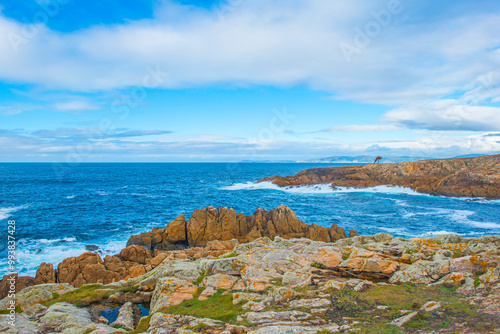 Wild shore with rocks and stones along the coast of northern Spain, Muxia, Galicia, September 12, 2024 photo