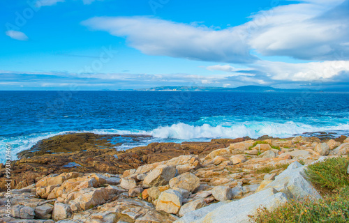 Wild shore with rocks and stones along the coast of northern Spain, Muxia, Galicia, September 12, 2024 photo