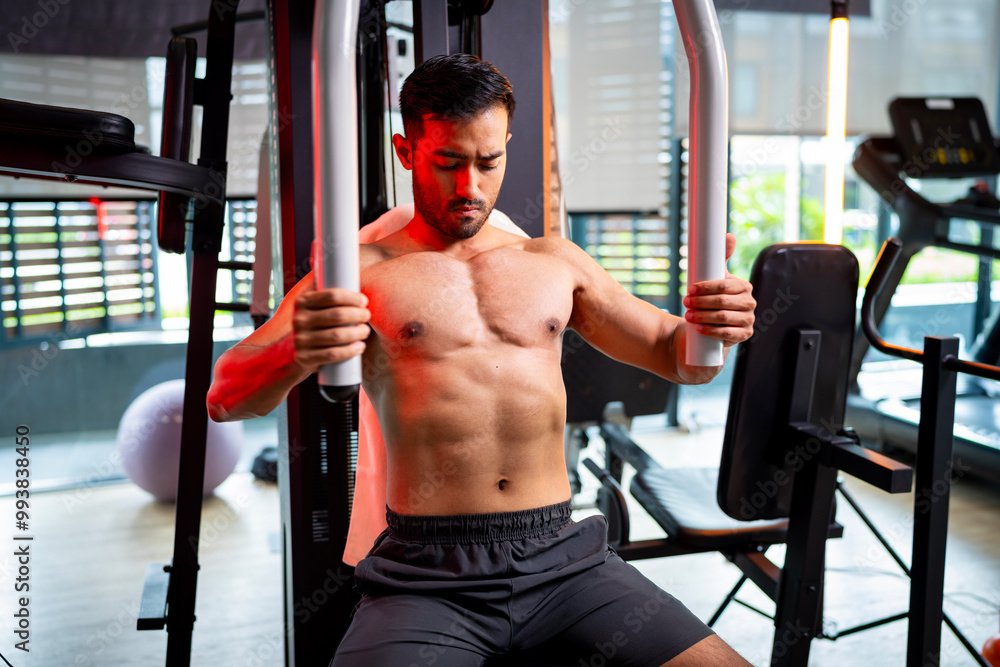 A strong Asian man is exercising to build muscle.. A strong Asian man is exercising to build muscle..