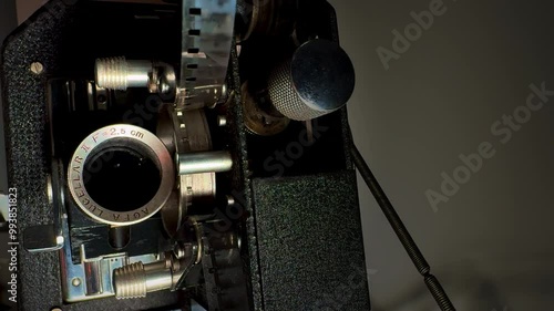 Old retro film projector, showing its design and engineering complexities antique cinema movie styla background photo