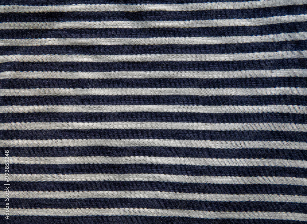 Black and white geometric stripes textile fabric for background. Top view. Black and white geometric stripes textile fabric for background. Top view.