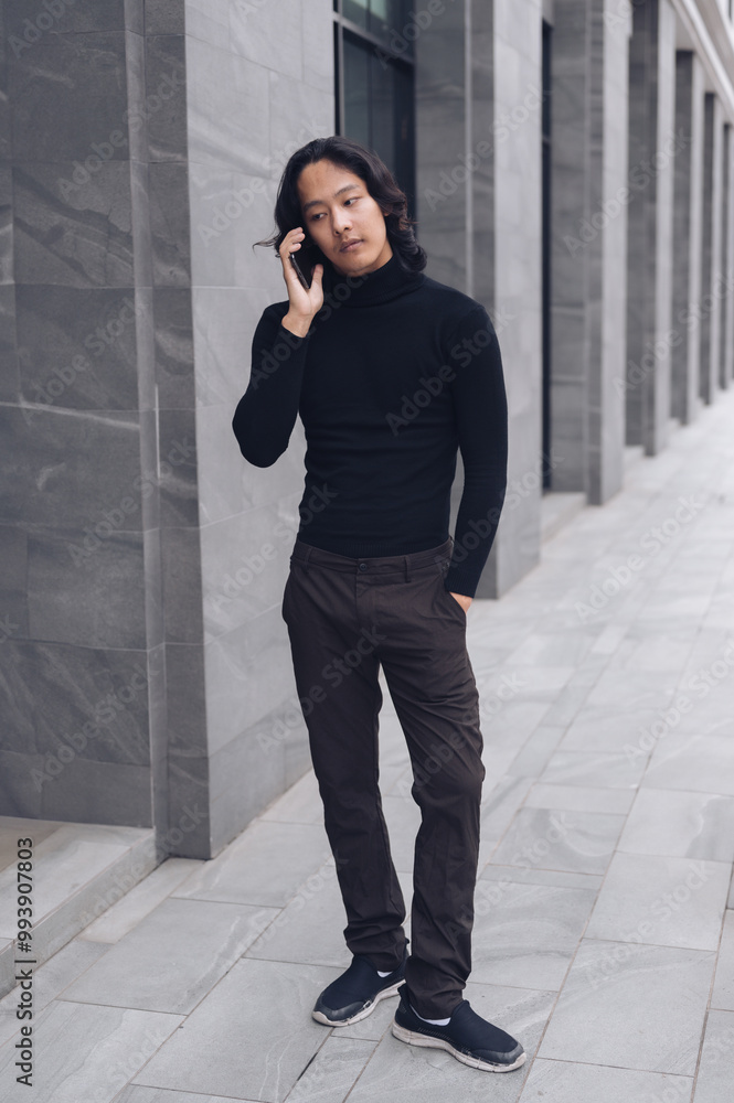elegant man in bowtie suit outdoor. businessman man using phone. man boss talk on smartphone elegant man in bowtie suit outdoor. businessman man using phone. man boss talk on smartphone